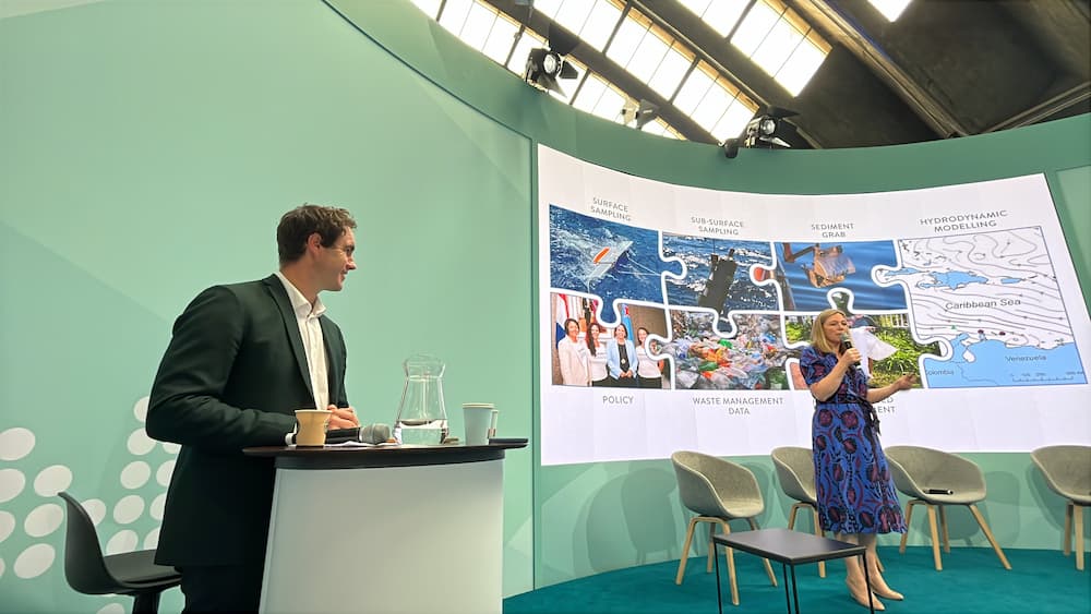 Caption: Emily Penn (eXXpedition) delivers a talk about citizen science for marine pollution